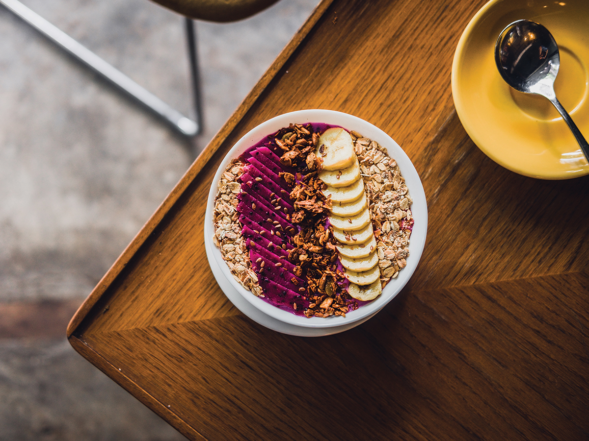 Superfood tropical smoothie bowl with dragon fruits banana